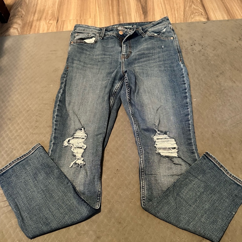 Old Navy distressed mid rise rockstar jeans. Size 12